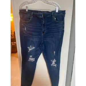 Distressed AE skinny jeans
